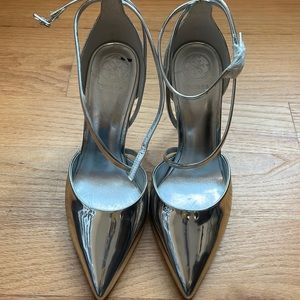 Guess silver pointy heel 3.5 inches high.